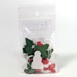 Packaged Christmas powder wafers by Glacial Art Glass on a white background