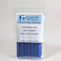 A package of Murrine Sticks, a type of glass stick, with a label indicating the color of the sticks as dark blue and Lilac flowers.