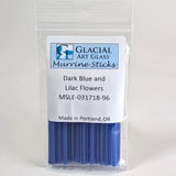 A package of Murrine Sticks, a type of glass stick, with a label indicating the color of the sticks as dark blue and Lilac flowers.