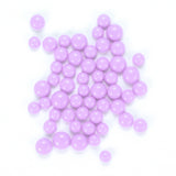 numerous small, round, and shiny purple beads or spheres scattered across a white background.