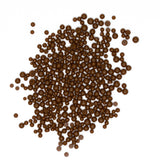 a large pile of small, round, brown objects scattered on a white background.