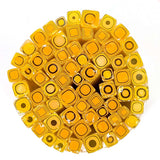 a circular arrangement of numerous small, yellow and black square and circle shapes, creating a visually striking and intricate design.