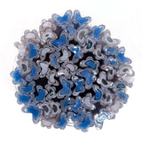 a circular arrangement of blue and white glass beads or stones, creating a visually striking and intricate design.