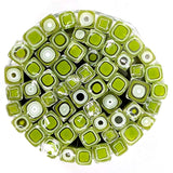 a circular arrangement of numerous green and white square-shaped objects, creating a visually striking and vibrant display.