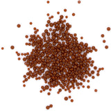 a large pile of small, round, brown objects scattered on a white background.