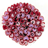 a circular arrangement of heart-shaped objects in shades of red and purple, creating a visually striking and vibrant display.