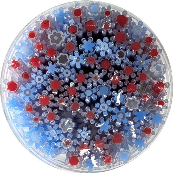 a circular arrangement of various colored straws, including red and blue ones, creating a visually striking and vibrant display.