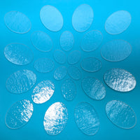 a bunch of circles that are on a blue surface