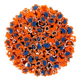 The image is a circular arrangement of various colored glass pieces, including shades of orange, blue, and white, creating a visually striking and vibrant display.