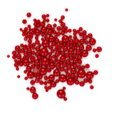numerous red balls scattered across a white background.