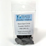Bag of black opal circle powder wafers with Glacial Art Glass label on a white background
