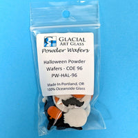 Packaged Halloween-themed powder wafers with Glacial Art Glass label on a blue background