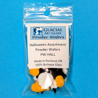 Packaged Halloween-themed powder wafers with Glacial Art Glass branding on a blue background