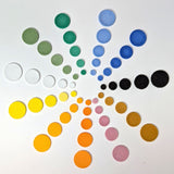 Nine color variations of Glacial Art Glass' fusible glass Circle Powder Wafers in COE 90