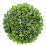 a circular arrangement of green and black heart-shaped objects, creating a visually striking and vibrant display.