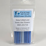 A package of glacial art glass marrine sticks, specifically deep colbal and dusty lilac flowers, made in Portland, Oregon.