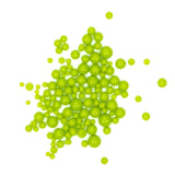 a large number of small, bright green spheres or beads scattered across a white background.