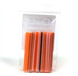 A clear plastic bag containing a set of orange and black colored pencils.