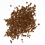 numerous small, round, brown objects scattered across a white background.