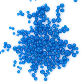 numerous small, round blue balls scattered across a white background.