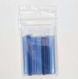 A clear plastic package containing a set of blue and purple plastic tubes.
