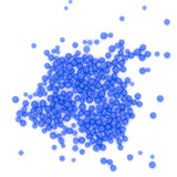 numerous small, round blue spheres scattered across a white background.
